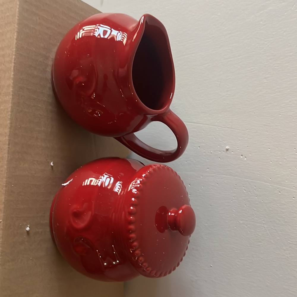 Sugar and creamer container